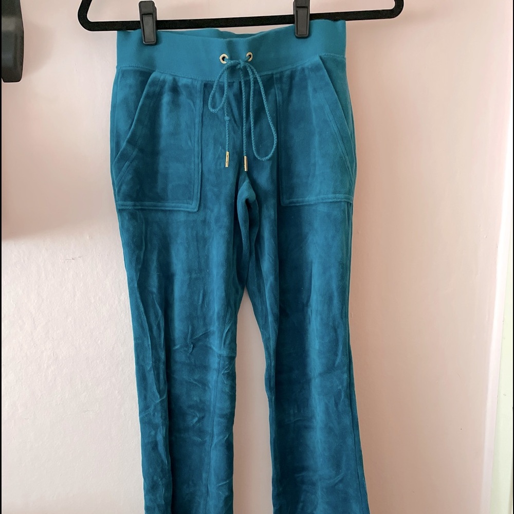 Turquoise velvet pant with gold buttons by juicy couture.